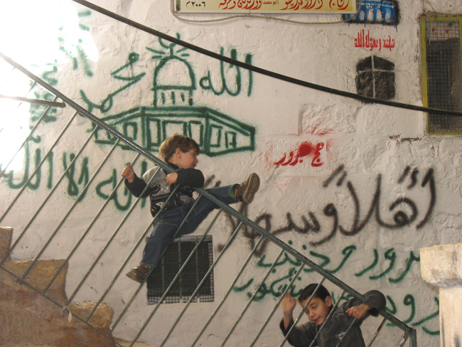 Graffiti announcing someone's Haj (pilgramage) to Mecca